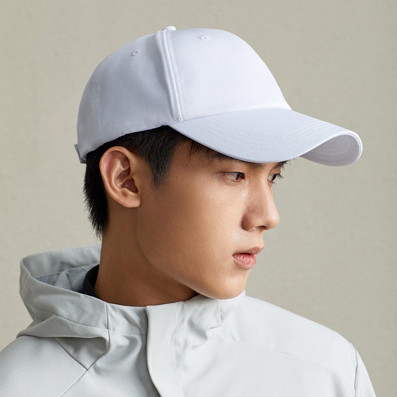 man wearing a white cap